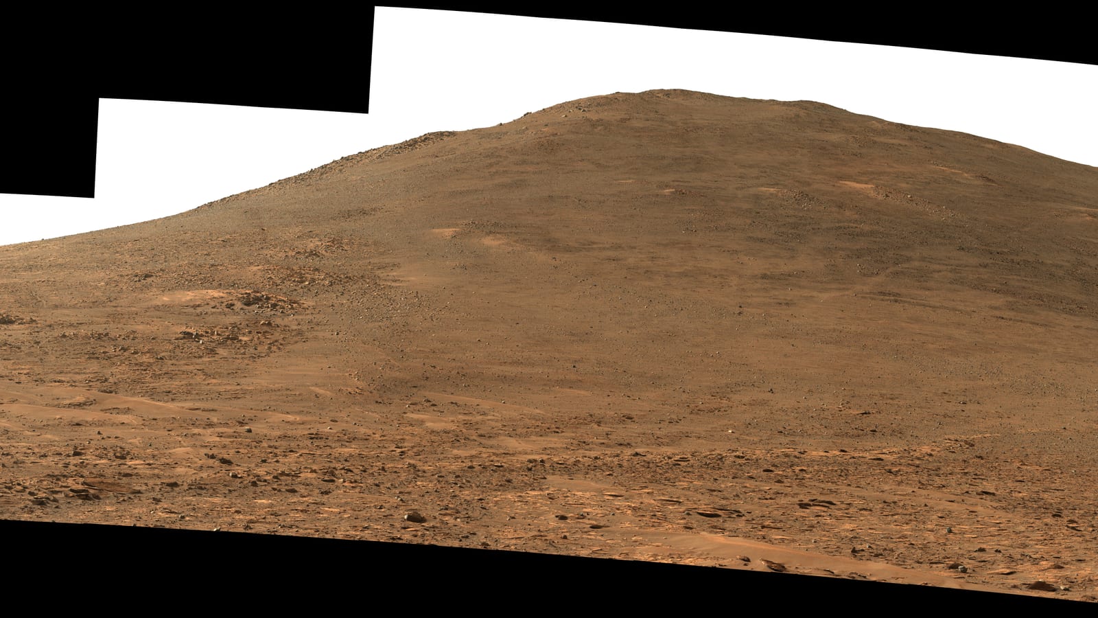 NASA Perseverance rover Mastcam-Z panorama looking south toward the rim of Jezero Crater, with rover tracks and rust-colored Martian terrain